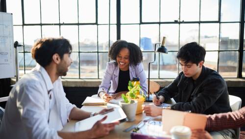 Coworkers in modern office space